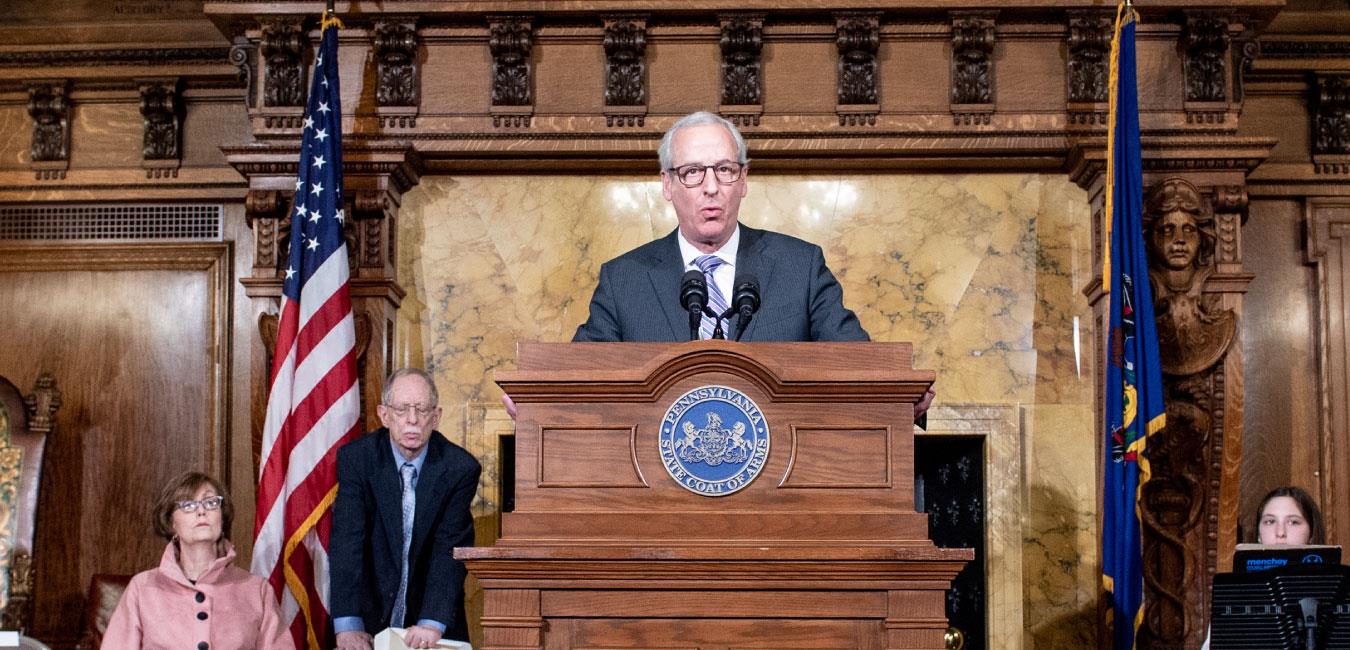 Representative Frankel speaking at podium in Governor’s Reception Room