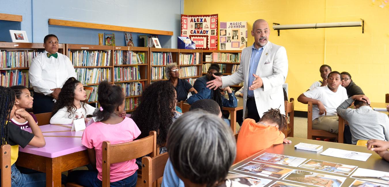 Representative Rabb speaking to group of students in classroom