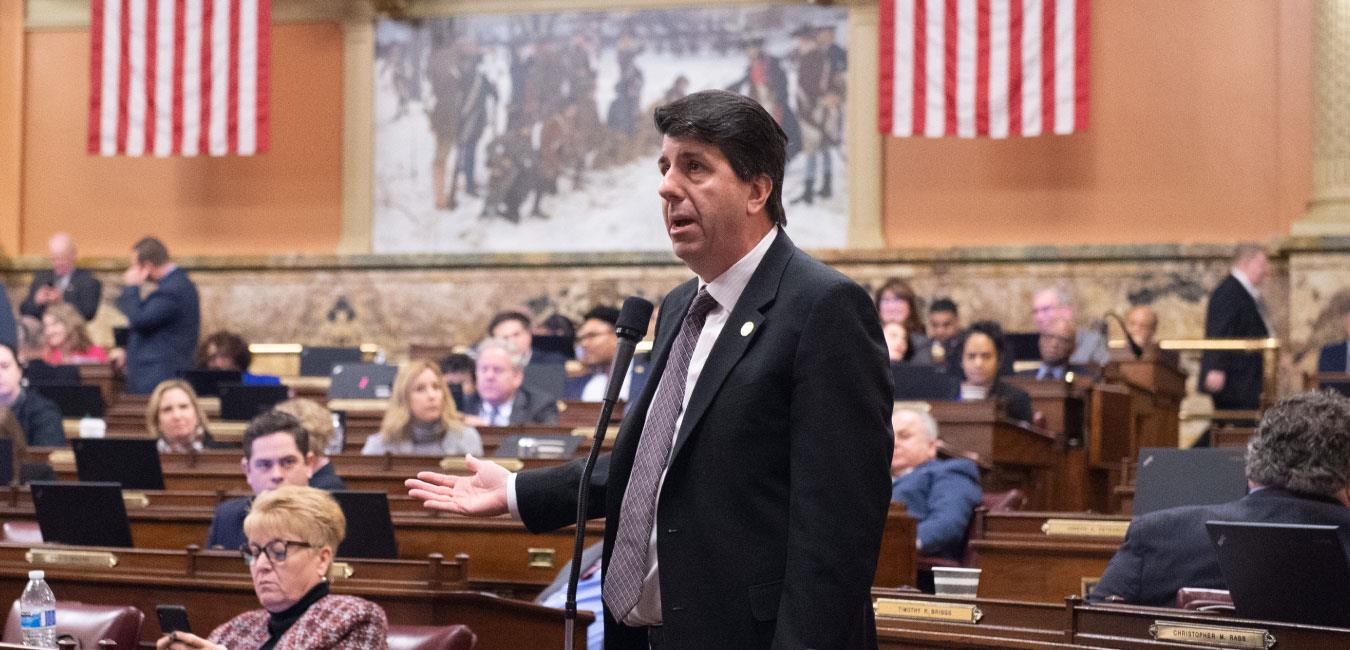 Representative Ciresi standing and speaking on House floor