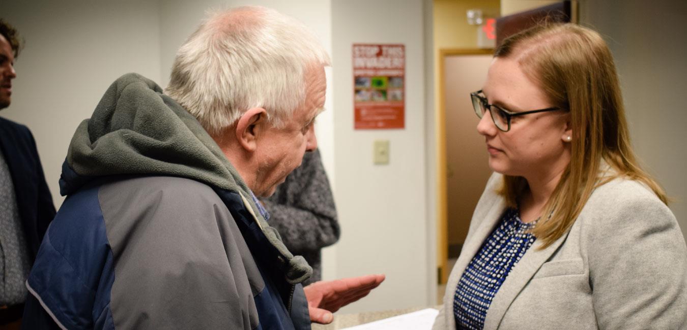 Representative O’Mara speaking to elderly man